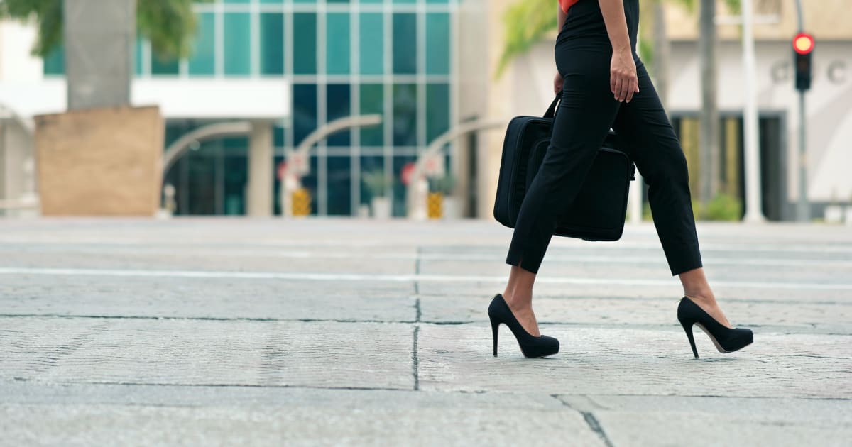 woman walking in stilettos
