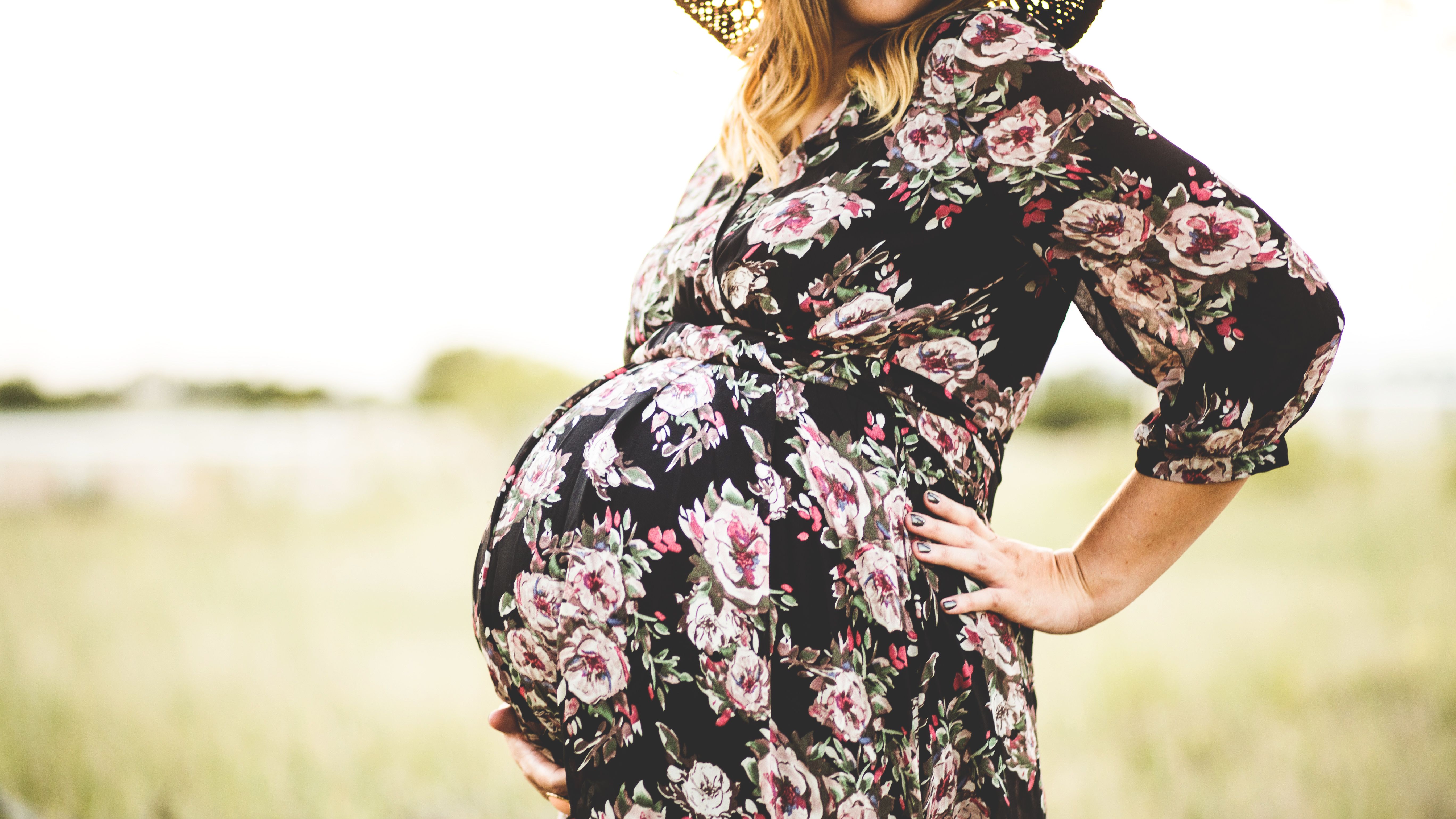 19 Maternity Party Dresses to Accommodate a Growing Baby Bump