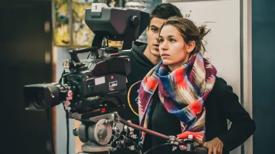 Woman Working at TV Station
