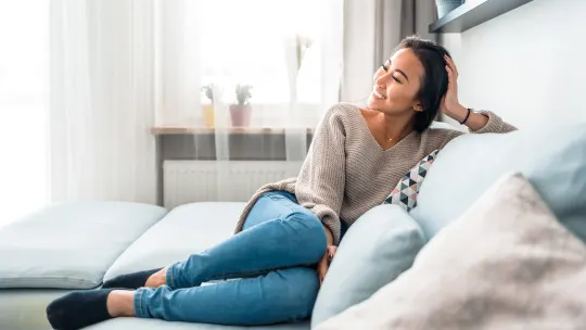 woman lounging on the couch