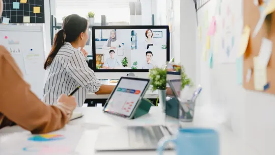 People in conference room during meeting