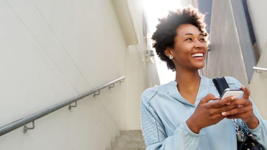 Happy woman on the phone