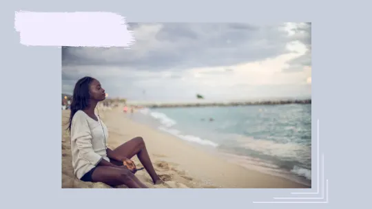 a woman relaxing on the beach.