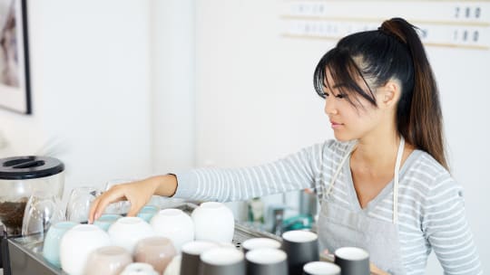 teenager working in a cafe
