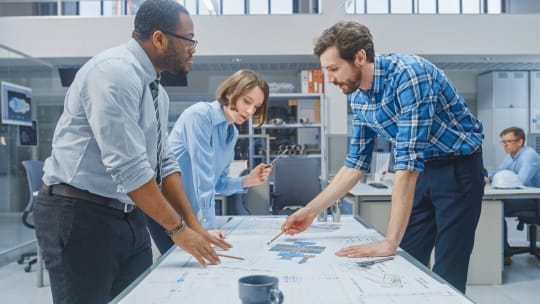 Product development team working on plans