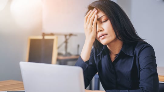 Woman Stressed at Work