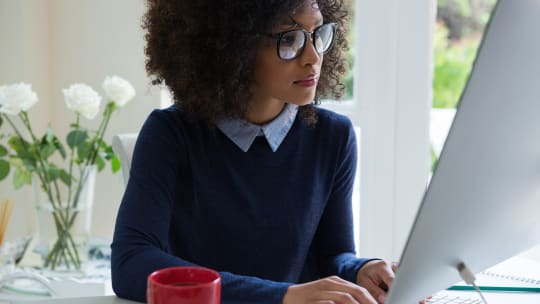 Woman Using Computer