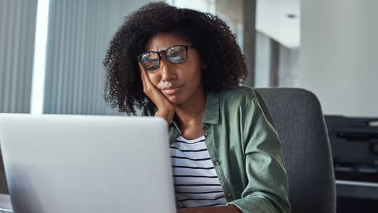 Sad woman at work