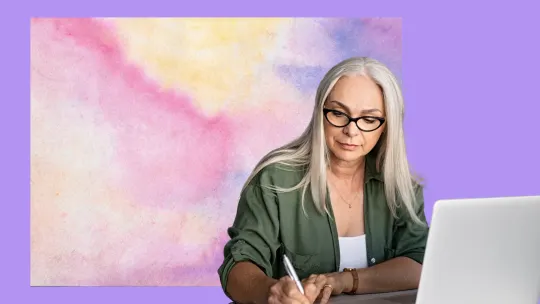 woman journaling at work
