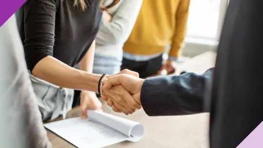 two people shaking hands