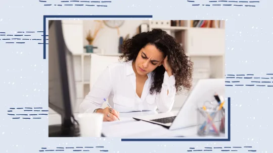 woman looking annoyed in front of her computer