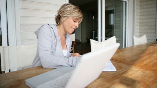 Woman working from home on laptop