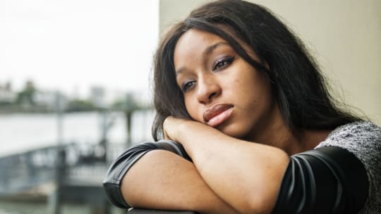 young woman dealing with depression after college