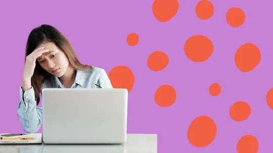 woman sad looking at laptop