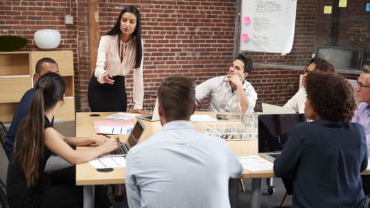 Woman leading meeting
