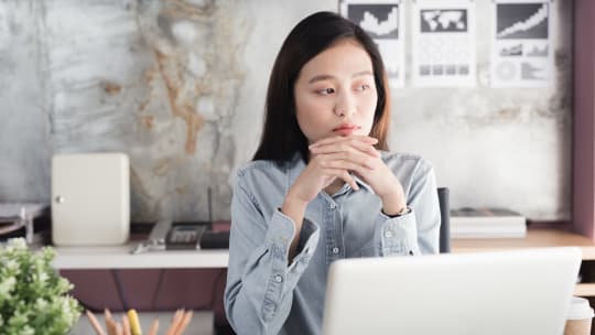 woman looking sad at work