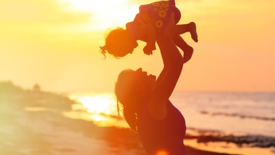 Mother playing with child