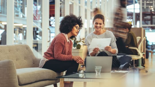 two women meeting at work
