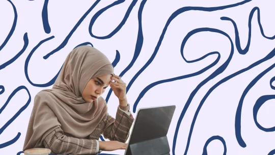 woman looking stressed at work