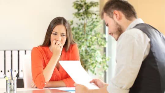 nervous woman in meeting