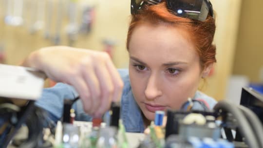 woman working on an invention