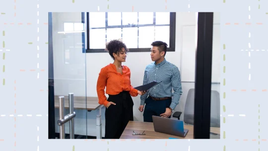 two people talking at work