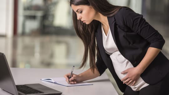 Pregnant Woman Working