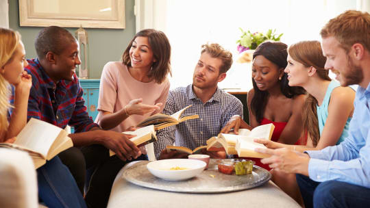 friends discussing book at a book club