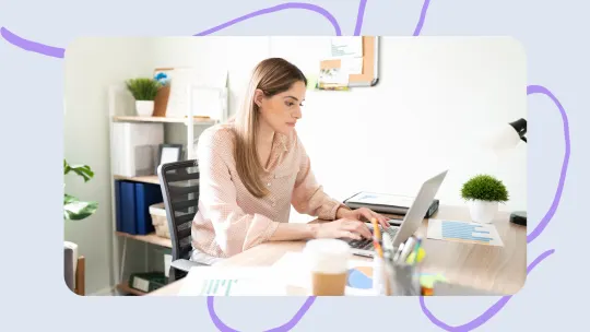 a woman writing a resume