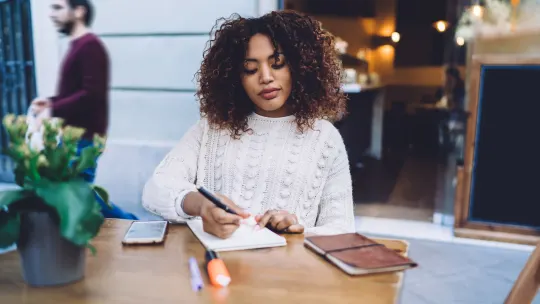 Woman working in notebook