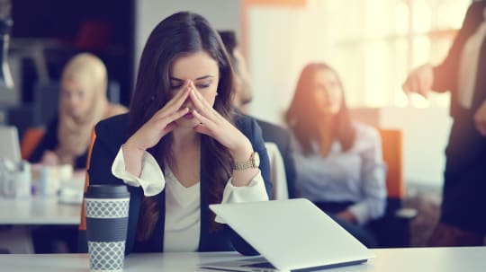 frustrated woman with laptop
