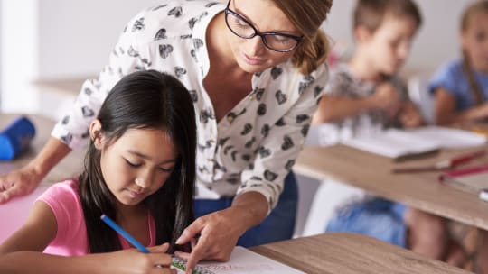 Teacher with student