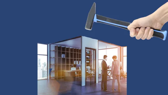 hammer smashing through office