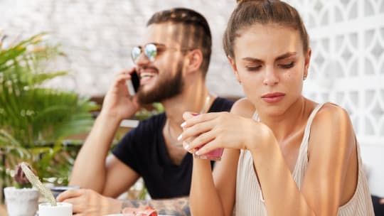 woman annoyed at man