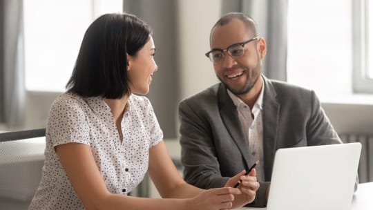 man mentoring woman
