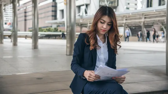 Woman holding resume
