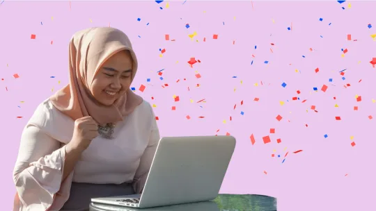 woman celebrating at work