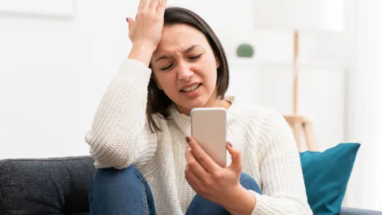 Frustrated woman on video call
