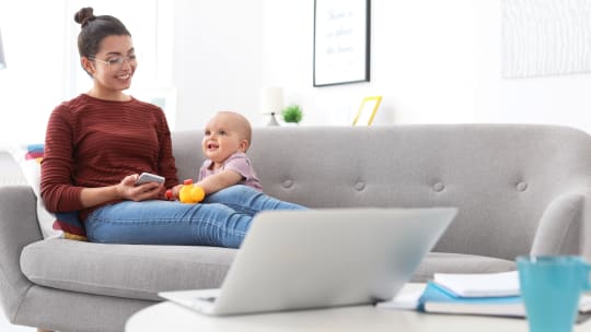 Woman with baby daughter
