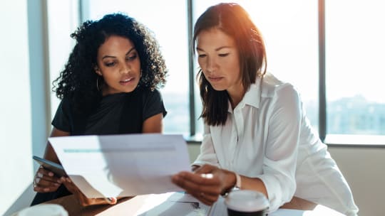 Two women at work