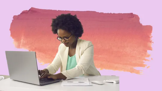 woman typing on a laptop