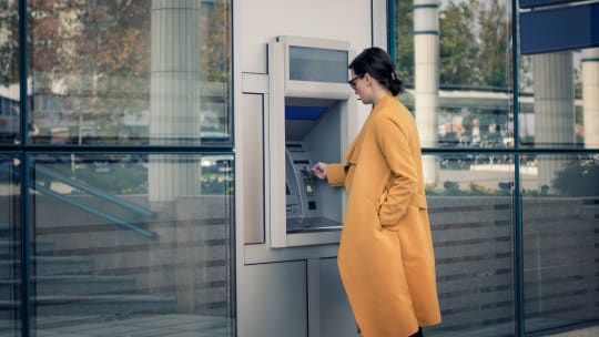 Woman at ATM