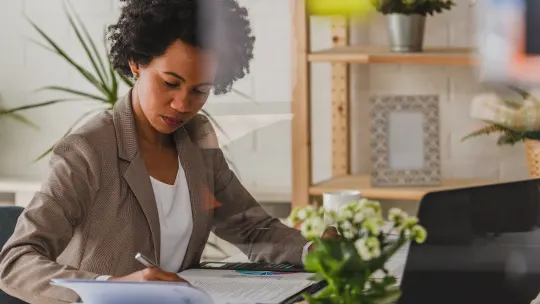 Serious woman on laptop