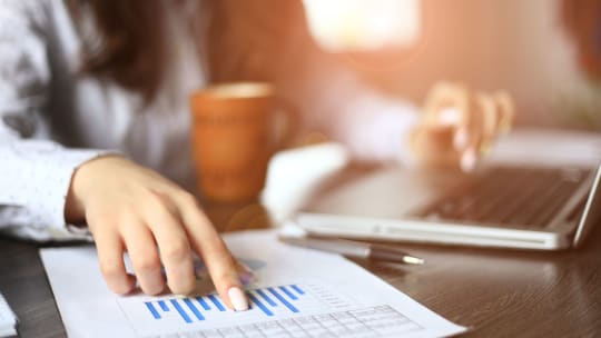 Woman Writing Report