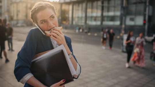 woman working two jobs multitasking