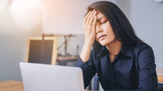 Woman frustrated at work