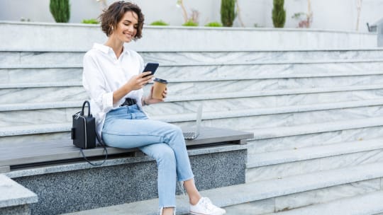 Woman sitting outside work