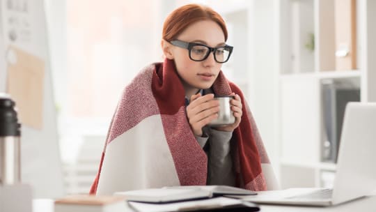 Cold woman in office