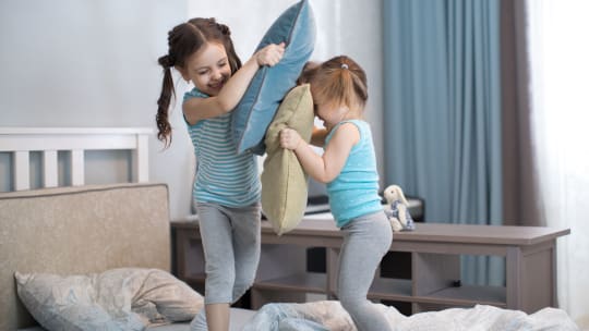 Kids pillow fighting