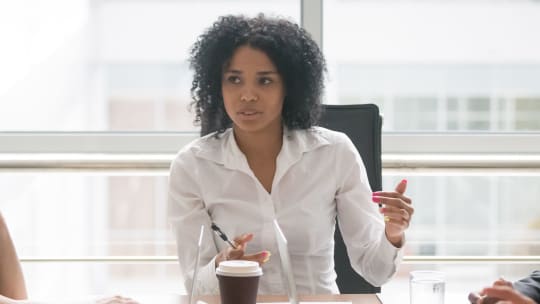 woman leading a meeting